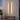 Black Linear Outdoor Wall Sconce | Waterproof LED Bar with Remote Option – switched on in a room