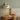 Cone Shade Wood Arm Wall Sconce | Pull-Chain Reading Light – switched on in a room