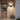 Gull Wing Outdoor Wall Light | Three-Head Up and Down LED Sconce – switched on in a room