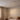 Linear Flush Mount Ceiling Light | Slim LED Bar in Black or White – switched on in a room