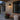 Tapered Glass Lantern Outdoor Wall Light | Classic Matte Black Porch Light – switched on in a room