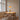 Wood-Trimmed Glass Pendant Light | Low-Profile Kitchen and Dining Light – switched on in a room