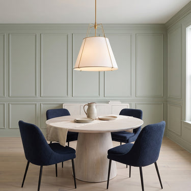 Fabric Drum Cage Pendant Light | Four-Light Brass Frame Chandelier – switched on in a room