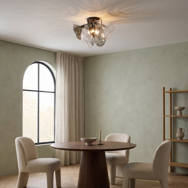 Hand-Blown Bubble Glass Ceiling Light | Smoke Gray or Amber Fixture – switched on in a room