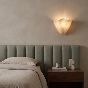 Hand-Blown Glass Petal Wall Sconce | Dimmable Damp-Rated Wall Light – switched on in a room
