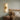 Marble-Look Resin Wall Sconce | Sculptural Warm LED Wall Light – switched on in a room