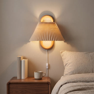 Pleated Fabric Half-Moon Wall Sconce | Wood Plug-In or Hardwired Light – switched on in a room