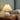 Pleated Paper Ceramic Table Lamp | Japanese-Style Bedside Light – switched on in a room