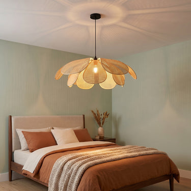 Rattan Petal Pendant Light | Handwoven Layered Shade in Five Sizes – switched on in a room