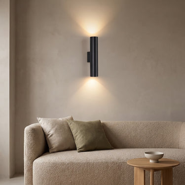 Round Aluminum Tube Wall Sconce | Two-Light LED Wall Lamp – switched on in a room