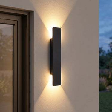 Slim Aluminum Outdoor Wall Light | IP65 Integrated LED Sconce – switched on in a room