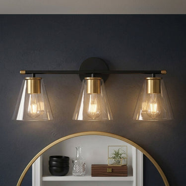 Three-Light Clear Glass Vanity Light | Black and Brass Bath Fixture – detail view