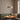 Travertine Cylinder Pendant Light | Wabi-Sabi Stone Hanging Lamp – switched on in a room