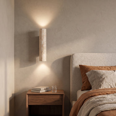 Travertine Cylinder Wall Light | Natural Stone Up-Down Sconce – switched on in a room