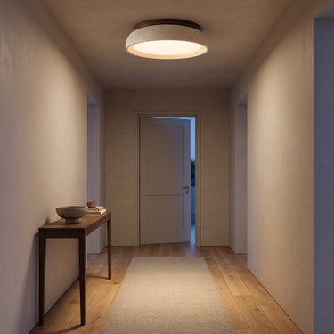 Travertine Stone Flush Mount Ceiling Light | Low-Profile Wood Accent LED – switched on in a room