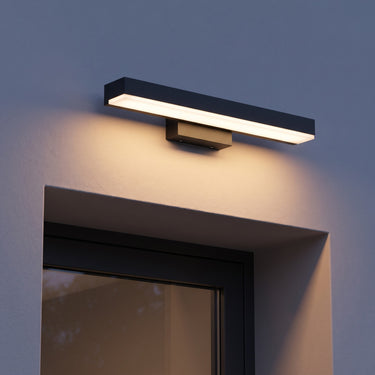 Wide Flat Outdoor Wall Light | Warm LED with Optional Motion Sensor – switched on in a room